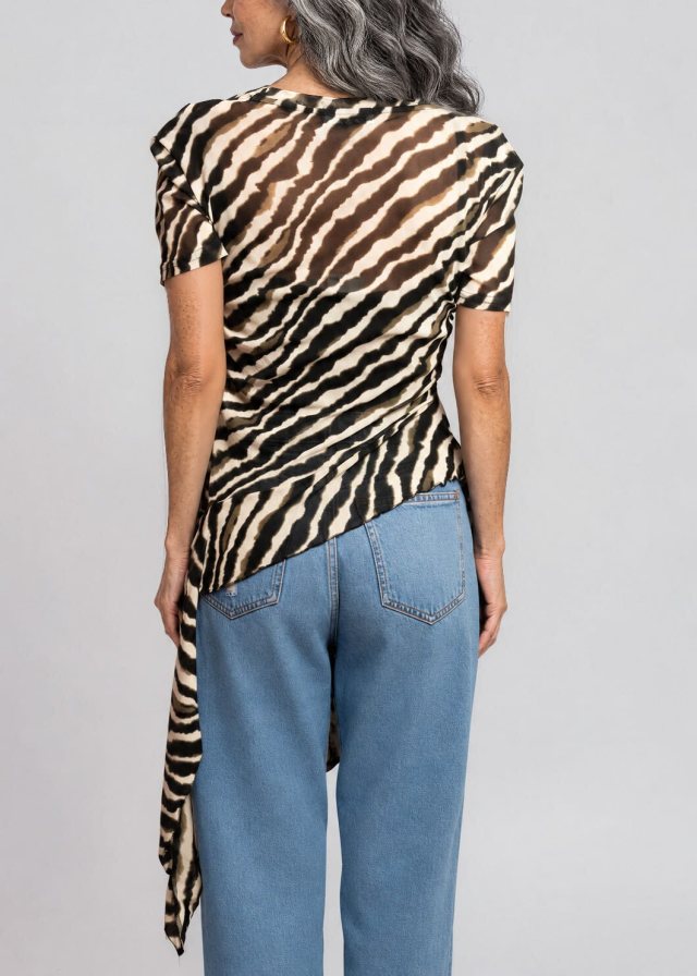 Lucía wearing Zebra Side Tie Asymmetrical Blouse, back