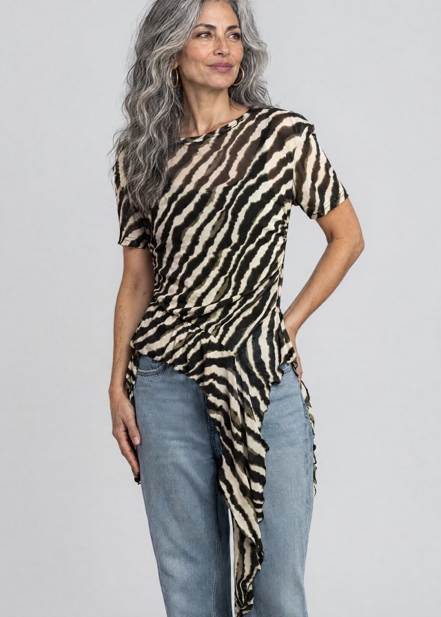 Lucía wearing Zebra Side Tie Asymmetrical Blouse