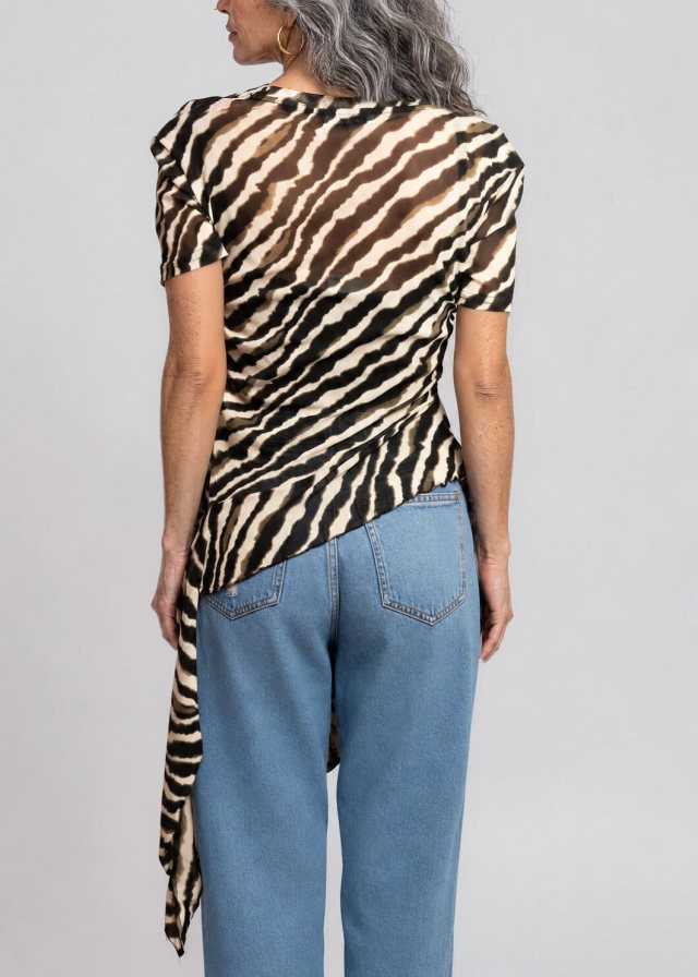 Lucía wearing Zebra Side Tie Asymmetrical Blouse, back