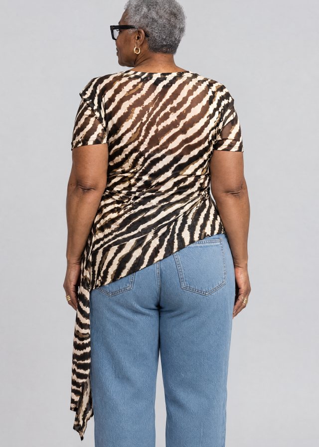 Yvonne wearing Zebra Side Tie Asymmetrical Blouse, back