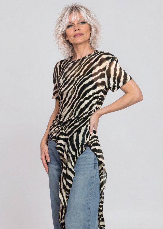 Joan wearing Zebra Side Tie Asymmetrical Blouse