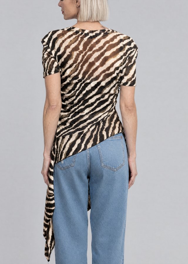 Ingrid wearing Zebra Side Tie Asymmetrical Blouse, back