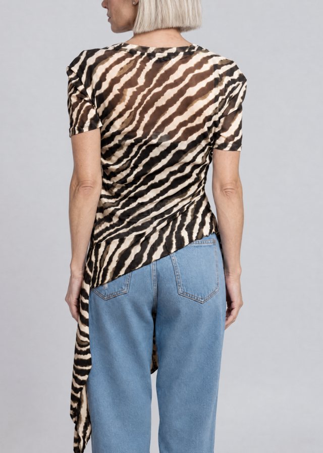 Ingrid wearing Zebra Side Tie Asymmetrical Blouse, back