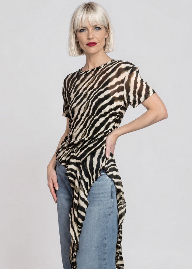 Ingrid wearing Zebra Side Tie Asymmetrical Blouse